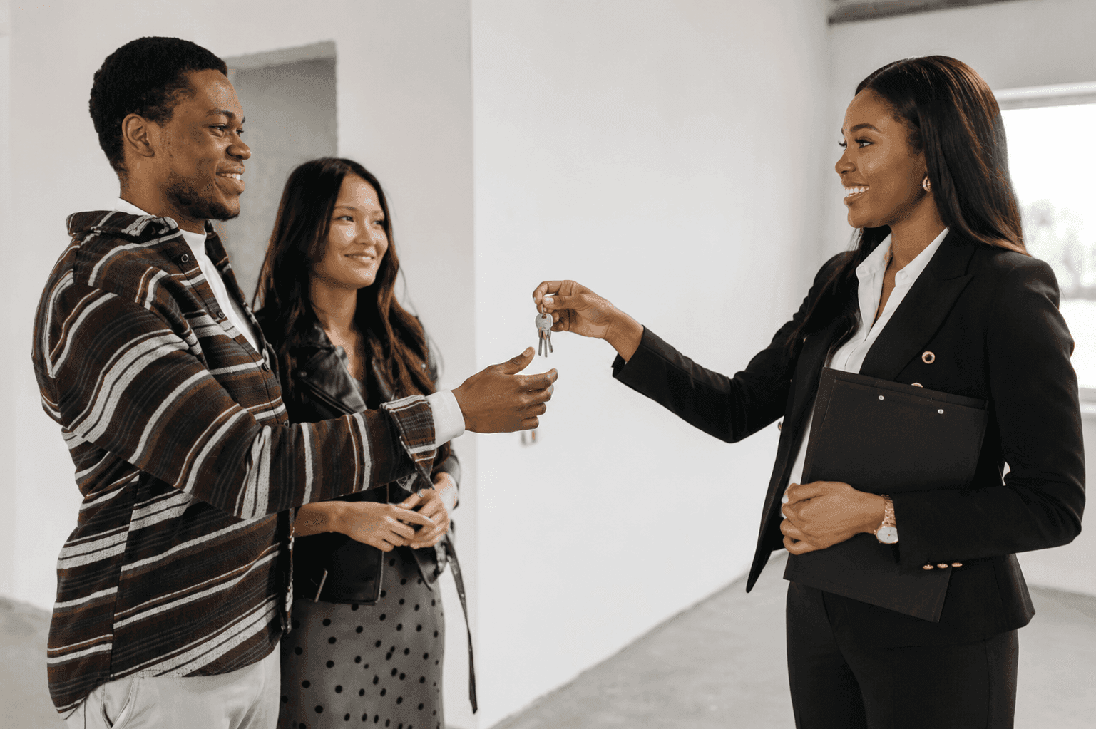 An OG Winners Homes agent with a client